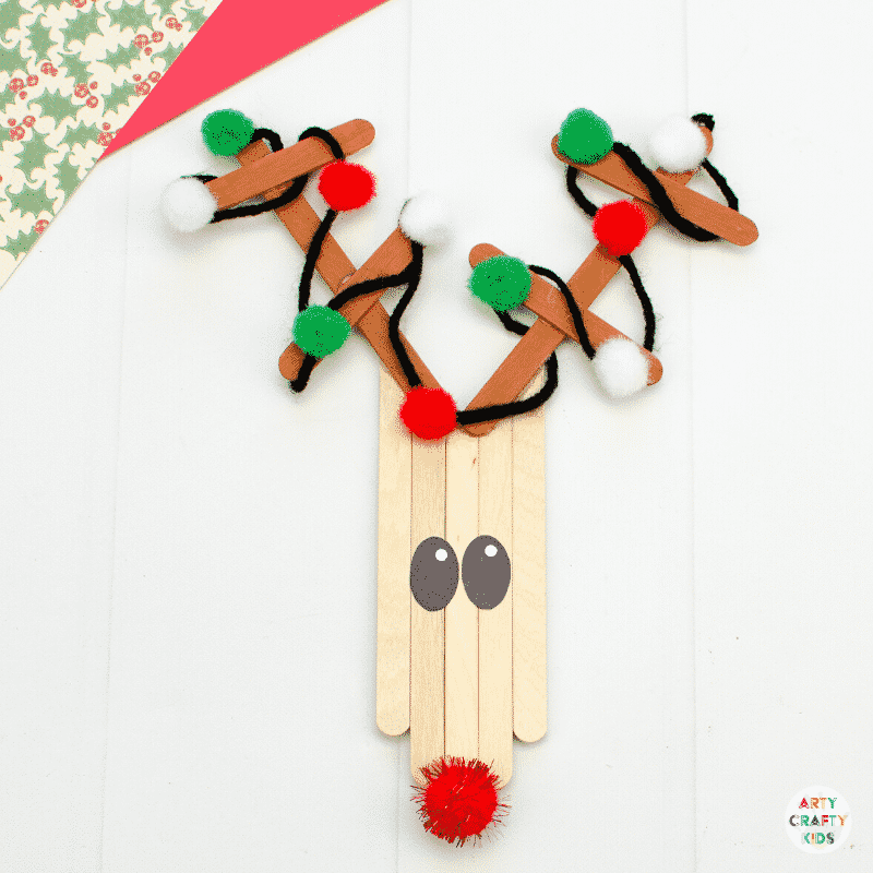 Learn how to make a Craft Stick Reindeer Ornament for the Christmas Craft | A fun and easy reindeer Christmas craft for kids.