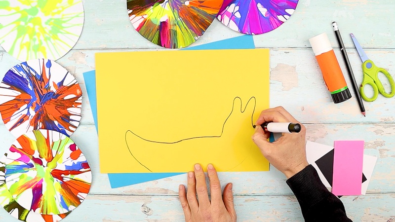 Draw the snail shape or use our snail template from the Arty Crafty Kids members area.