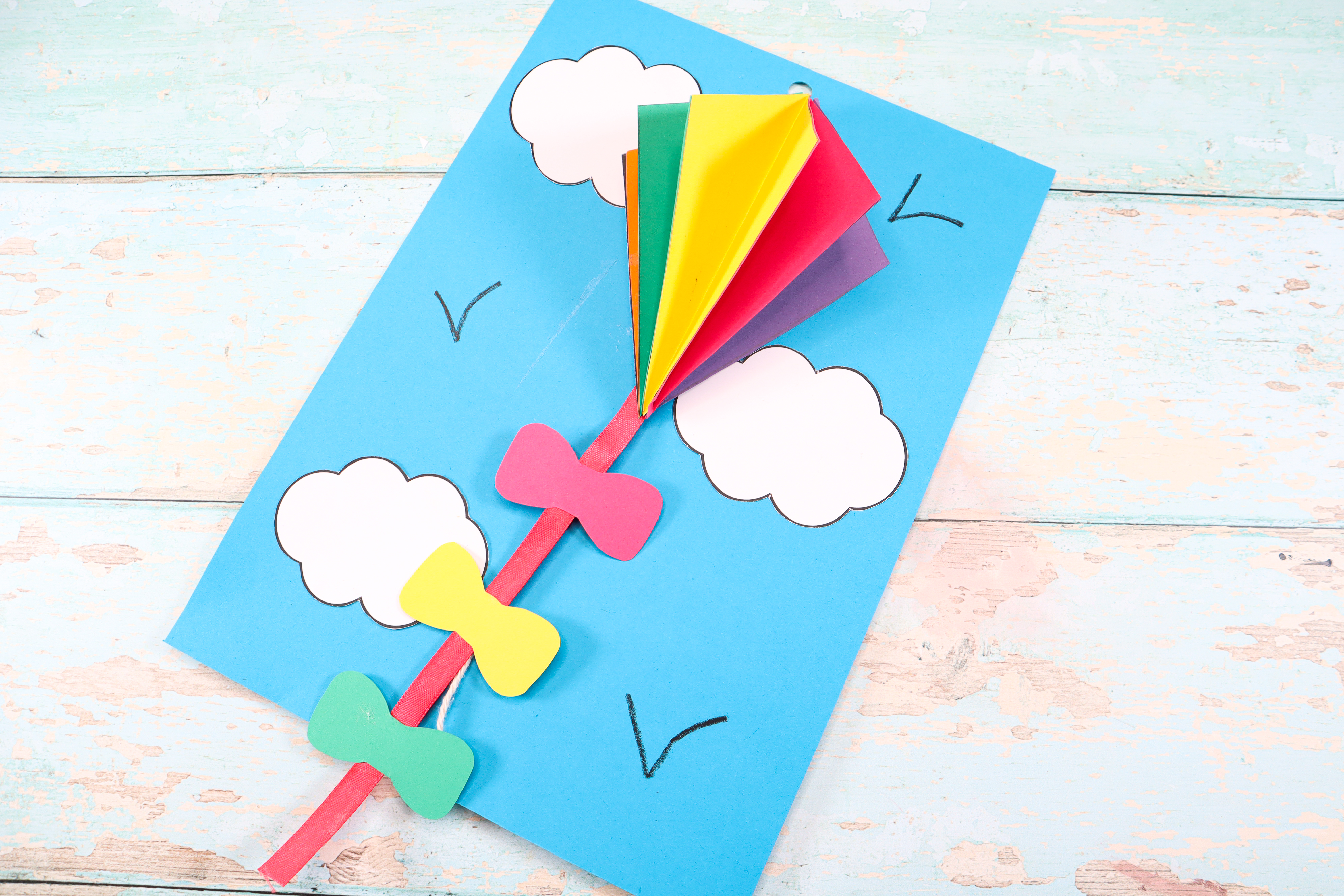 Let's make a 3D Flying Kite craft with the kids this Summer! A fun and easy to make 3D kite craft that uses a pulley system to make the kite fly high up into the sky!