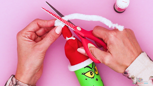 Step 12: Complete the Grinch's Hat with a Pom-Pom