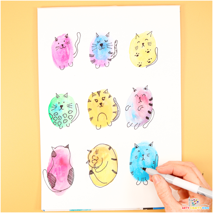 Watercolor Doodle Cats - Simple cat drawings on watercolor spots.