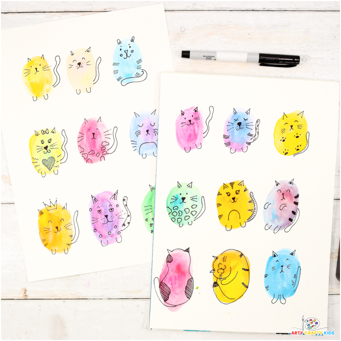 Watercolor Doodle Cats - Simple cat drawings on watercolor spots.