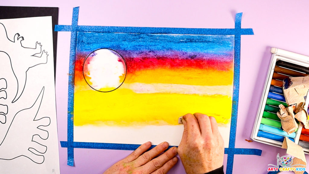 Image of a hand blending the yellow shades.