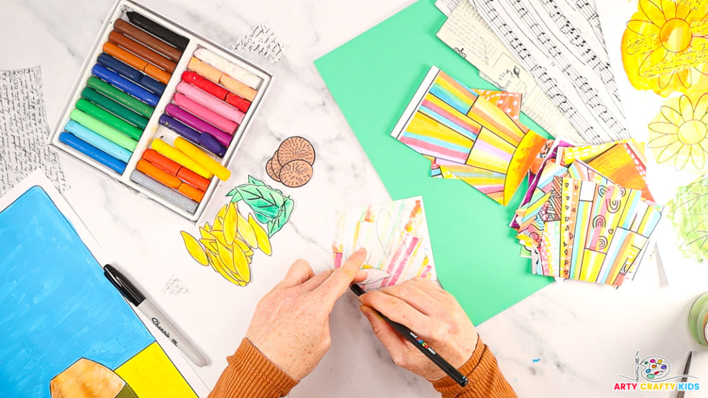 Image of a hand tracing around petal shapes on the backs of the artwork swatch.