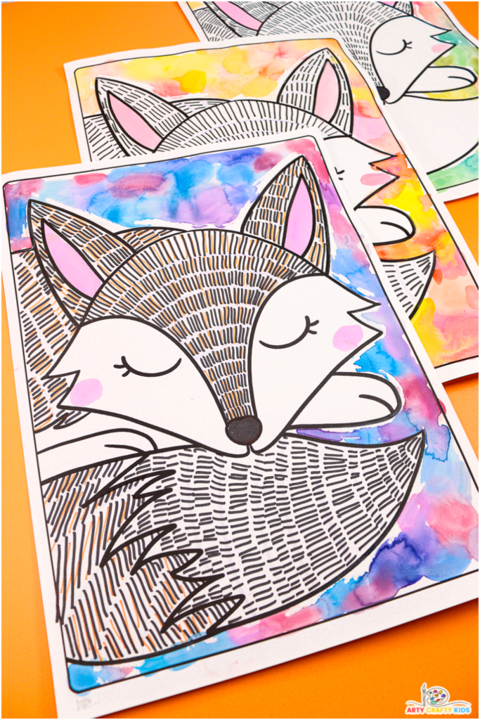 Colorful art project featuring a black-and-white fox with a vibrant watercolor background. Includes two templates: one with pre-drawn lines and another with blank spaces for kids to design their own.