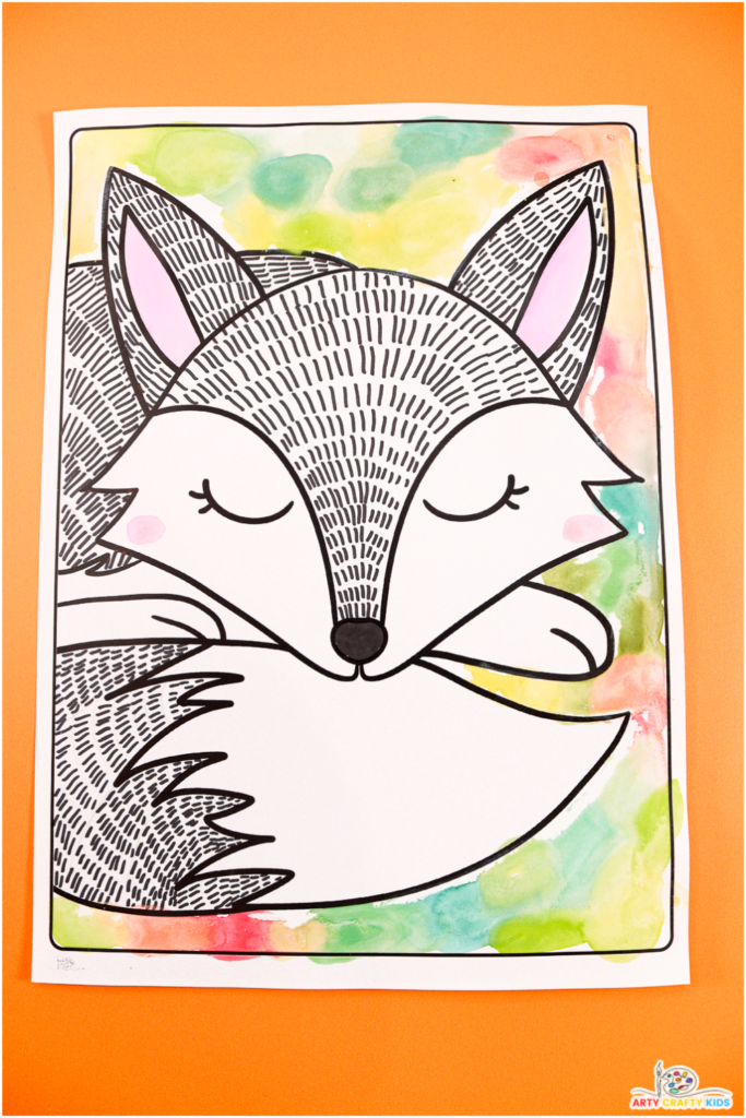 Colorful art project featuring a black-and-white fox with a vibrant watercolor background. Includes two templates: one with pre-drawn lines and another with blank spaces for kids to design their own.