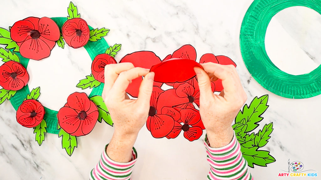 Image featuring a hand bending the base poppy write to make it 3D.