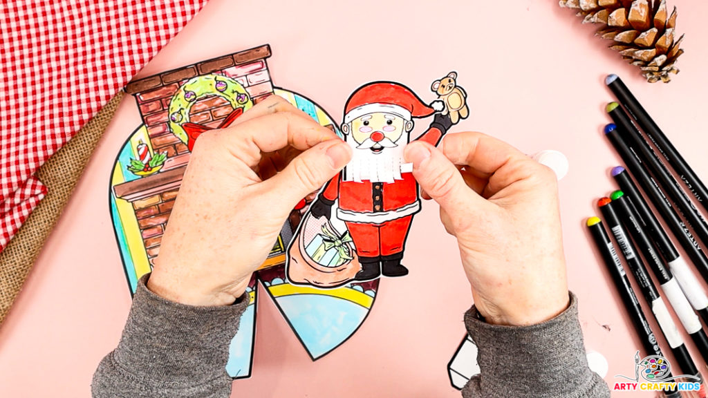 Image features Santa with his head affixed to the body element.