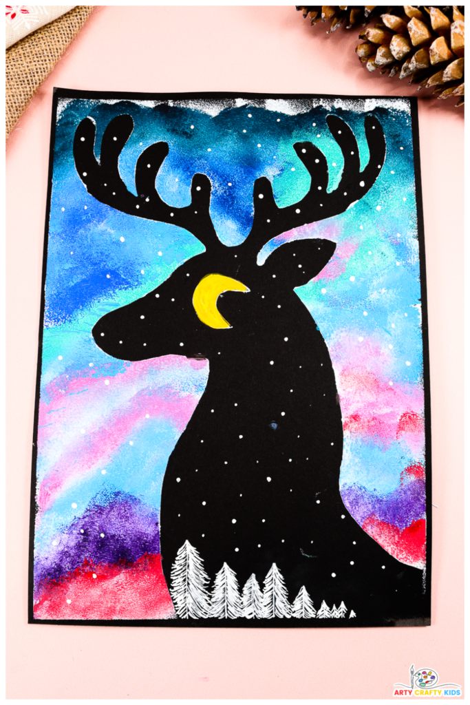 A colorful reindeer silhouette painting showcasing a vibrant northern lights-inspired night sky, emphasizing creative use of positive and negative space for a festive winter art project.